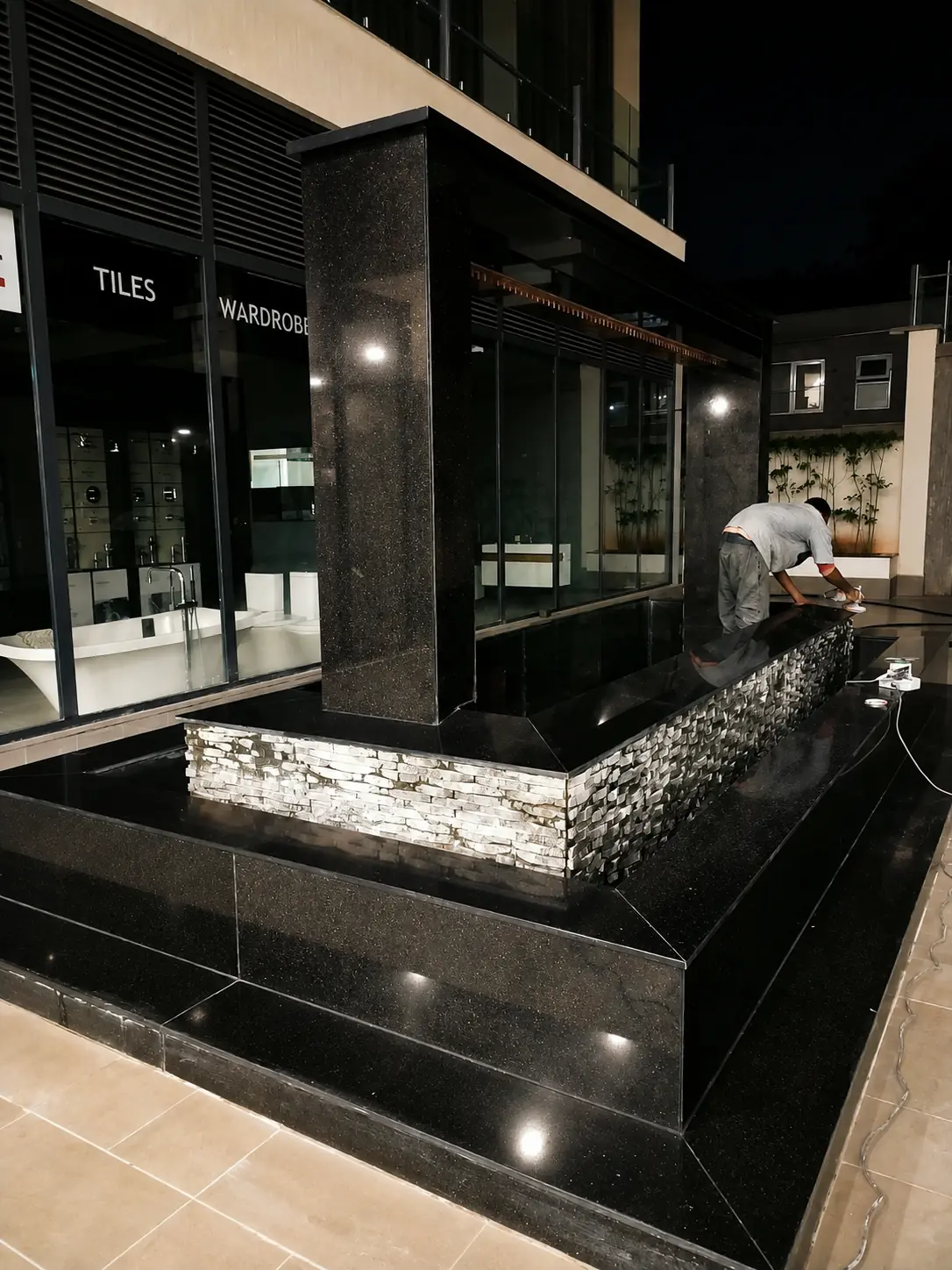 Polished black granite entrance in a commercial property