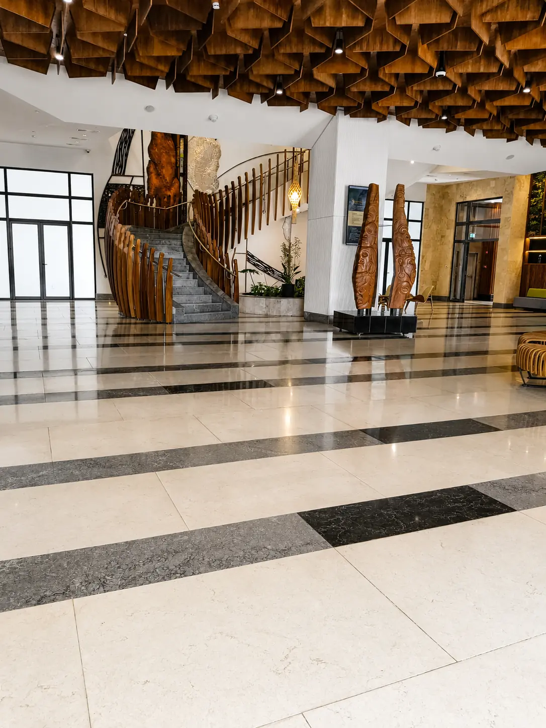 Restored high-gloss marble floor in a premium hospitality interior