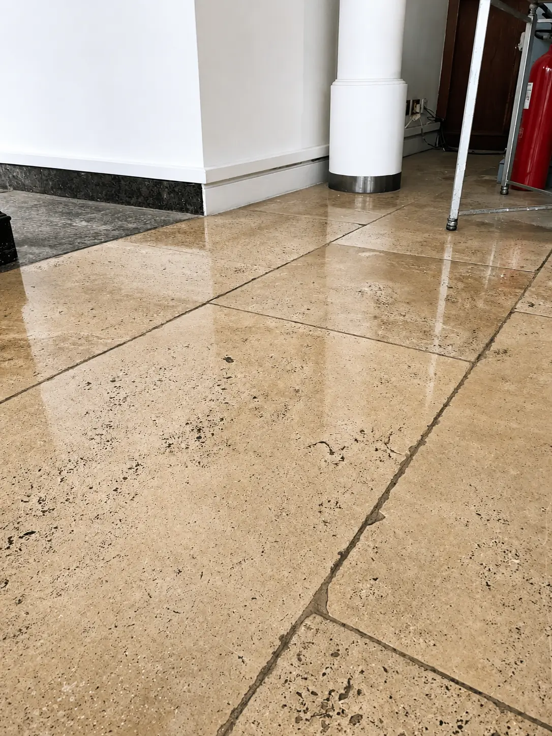 Close inspection of a polished speckled stone surface and reflected light